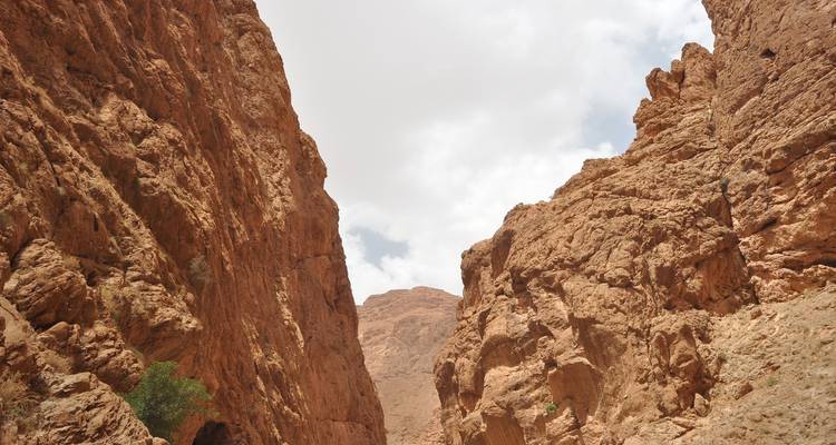 Steep canyon walls with a clear sky.