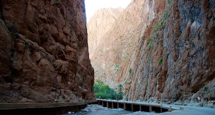 A road passing through rocky cliffs.