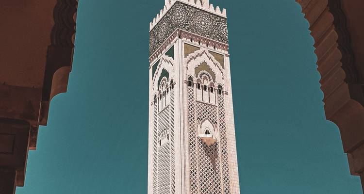 A detailed view of a tall ornate tower.