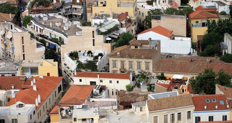 Aerial view of a densely built urban area with mixed architecture.