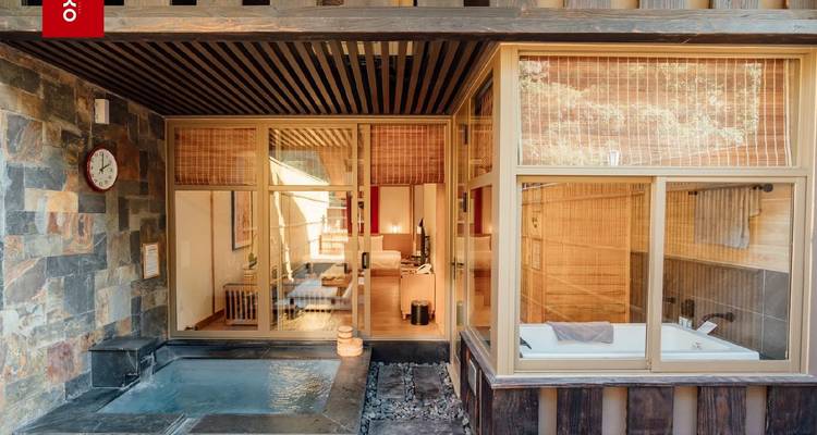 Modern interior with wooden decor and a small indoor pool.