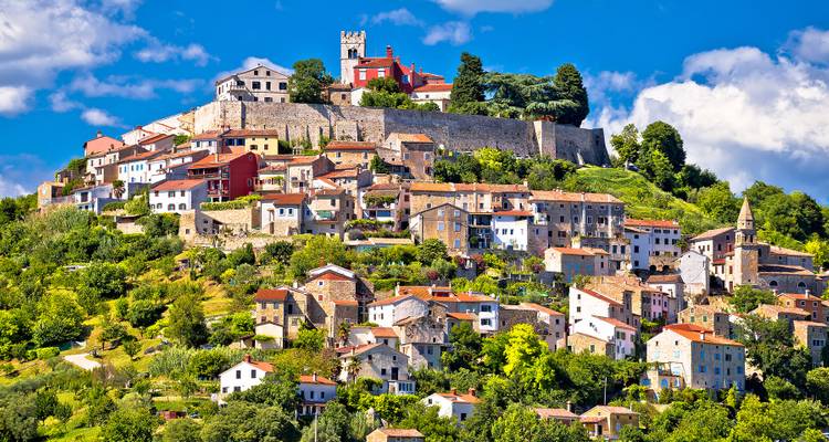 Hilltop town with medieval architecture and scenic setting.