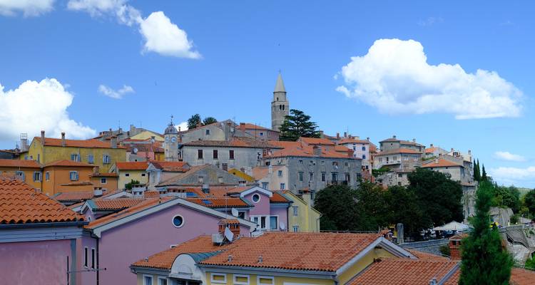 Colorful townscape under a clear blue sky.