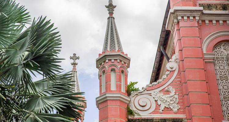 Close-up view of pink church spires.