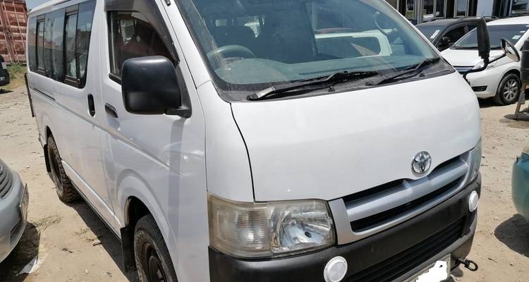 White van parked in a yard