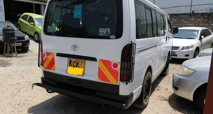 Rear view of a van with markings