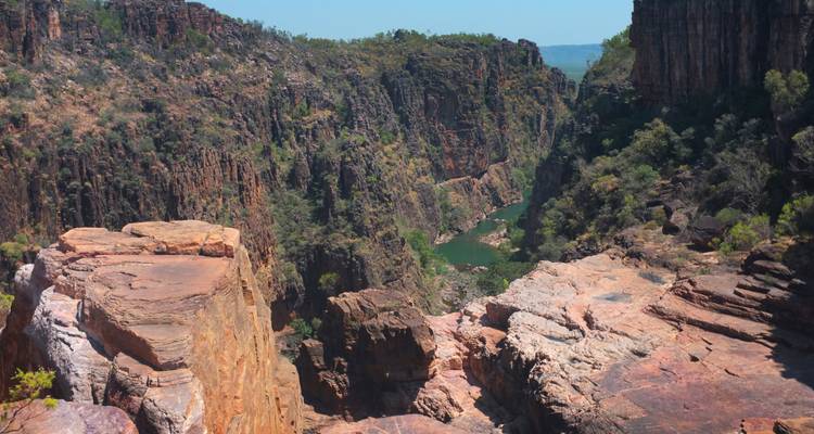 View of a deep gorge with a river below.