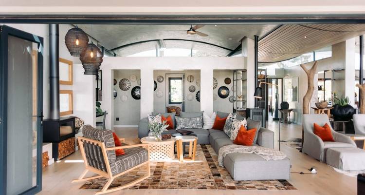 Modern lounge interior with outdoor views.