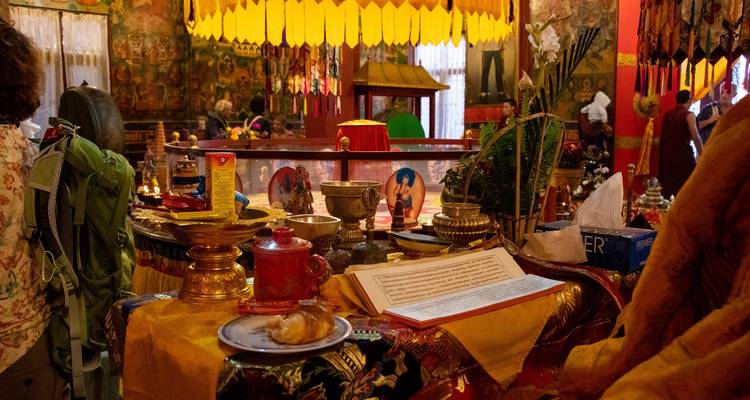 Interior of a religious temple with various artifacts.
