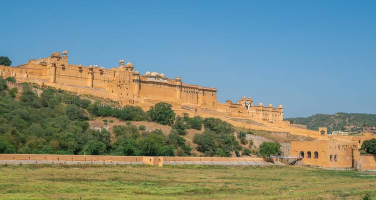Amber Fort on a hillside with a clear blue sky.