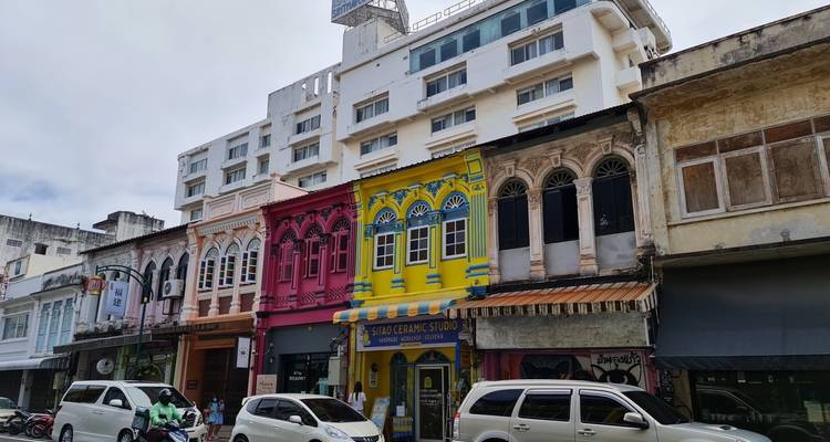 Street view of colorful colonial style buildings.