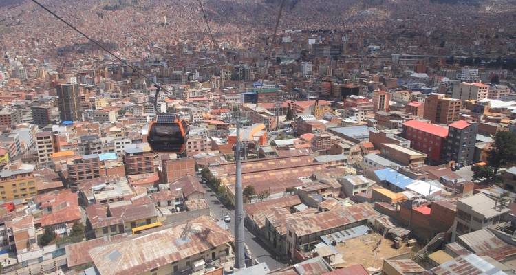 Urban landscape of a city with cable cars.