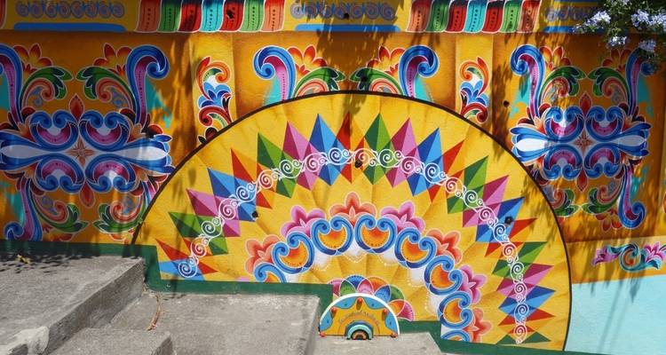 Colorful wall art with intricate patterns.