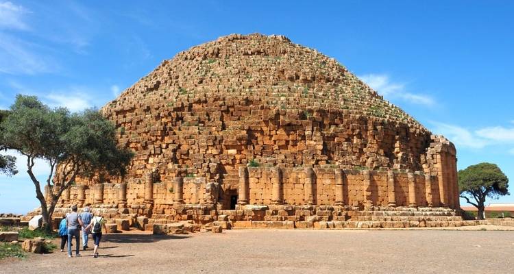 A group visiting the old Roman ruins at Tipasa, Algeria.