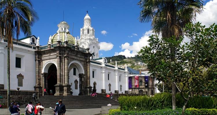 Beautiful historic building with domes in a city setting.