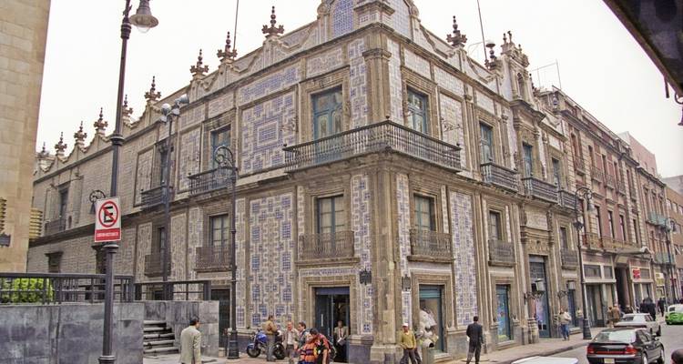 An ornate colonial architecture with a mosaic facade in Mexico City.