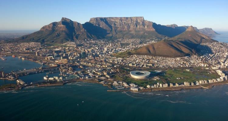 Aerial view of Cape Town with Table Mountain and coastline.