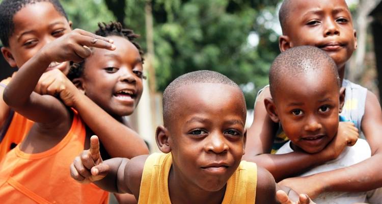 Group of children posing playfully.