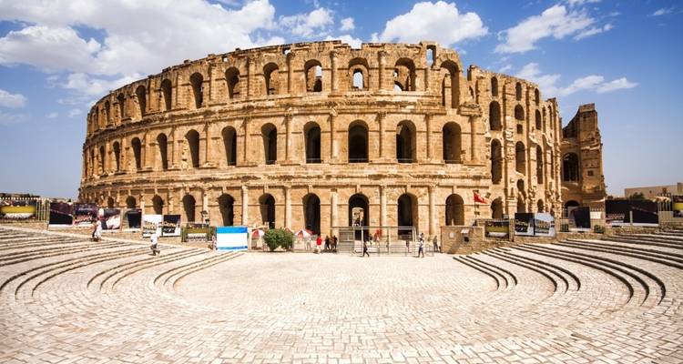 Amphitheater with weathered stone architecture.