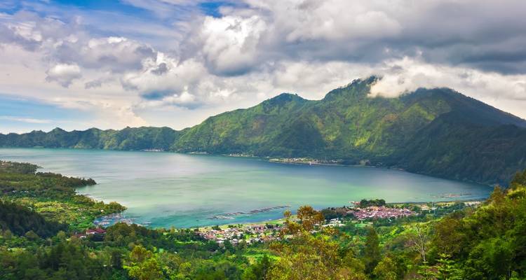 Scenic view of a lake with mountains in the background.