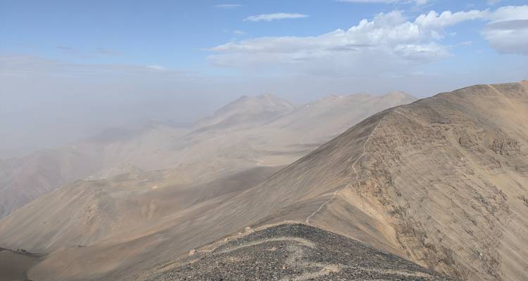Expansive mountain view with some mist.