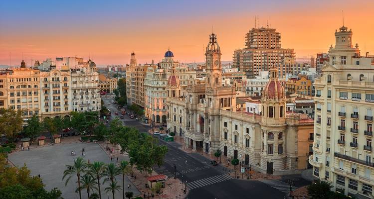 Aerial view of Valencia, Spain with the town hall building in view during sunset.