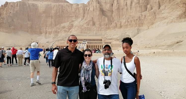 Group of tourists posing in front of the Hatshepsut Temple.