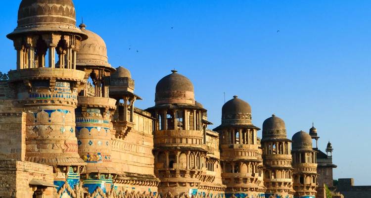 Exterior view of a historic fortress with domes and towers.