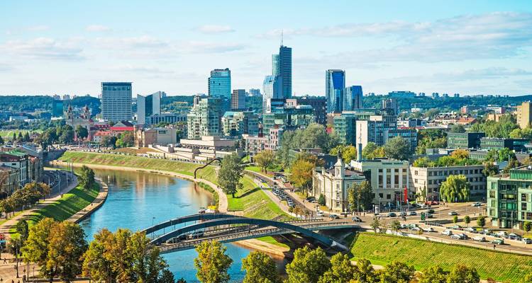 Magnificent view of a city river with urban skyline in Vilnius.
