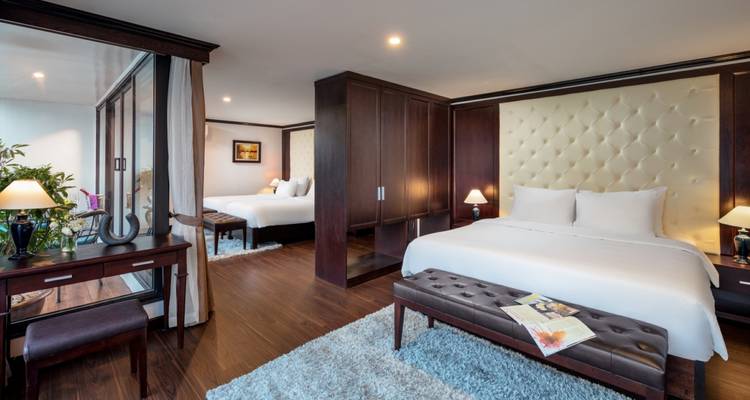 Exceptionally styled cruise suite with rich furnishings and ocean views.