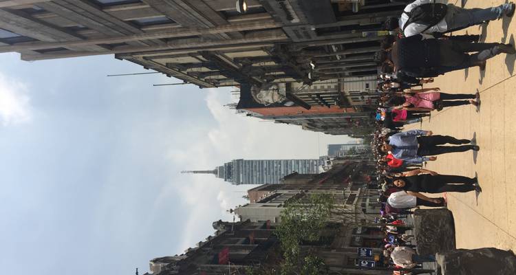 A bustling city street filled with people.