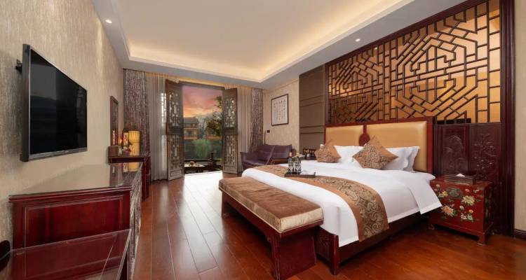 Luxurious hotel room with a view of traditional Chinese architecture