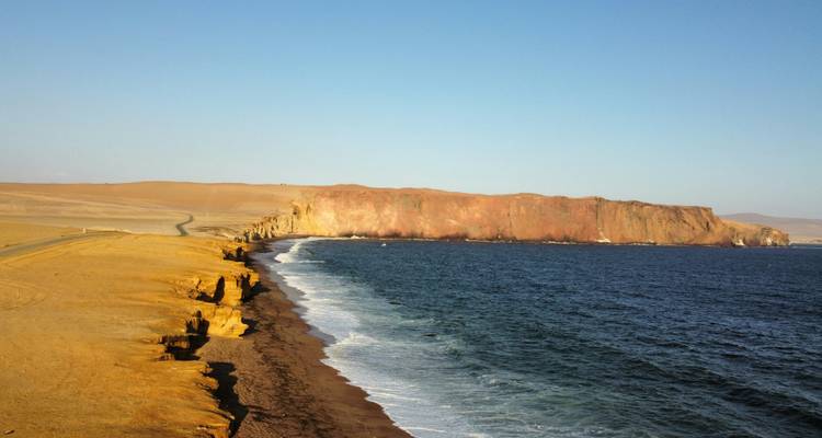 Coastal view with cliffs and ocean in the Paracas National Reserve.