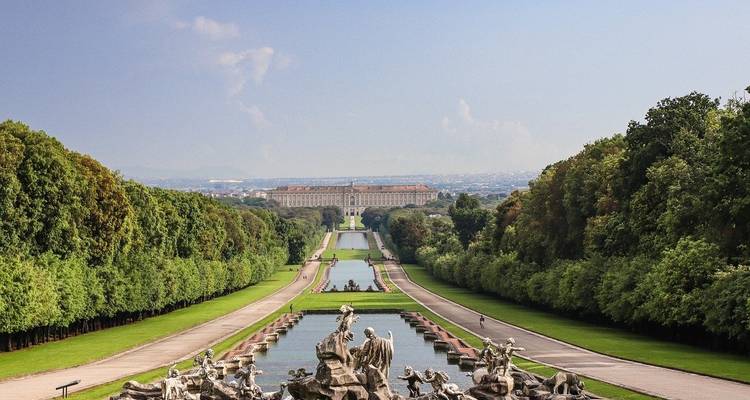 Palace at the end of a long garden path and fountains in Caserta.