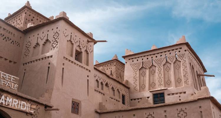 Traditional Moroccan architecture against a blue sky.