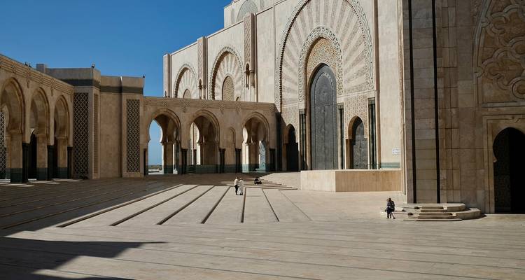 Large mosque facade with arches.