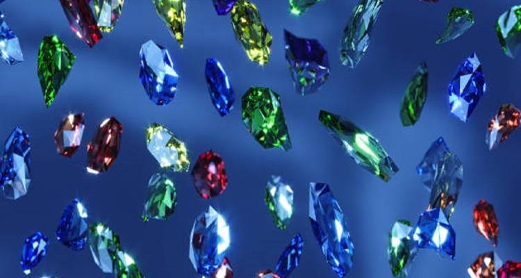 Zwevende kleurrijke edelstenen op een blauwe achtergrond.