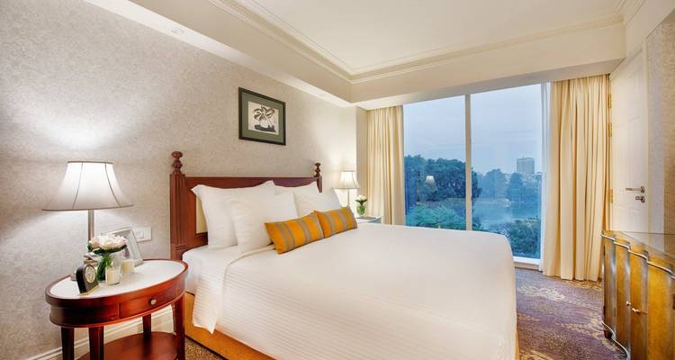 Hotel room with a cozy ambiance and large window view