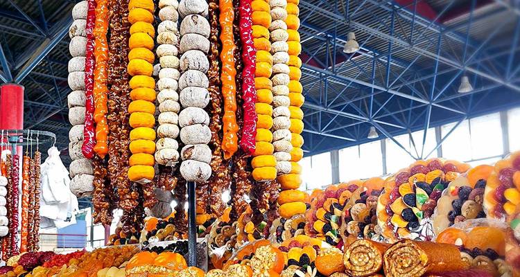 Display of traditional sweets and dried fruits.