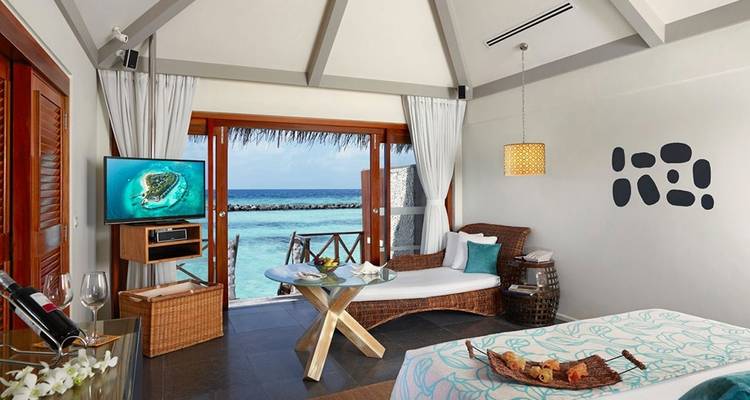 Luxurious villa interior with ocean view.