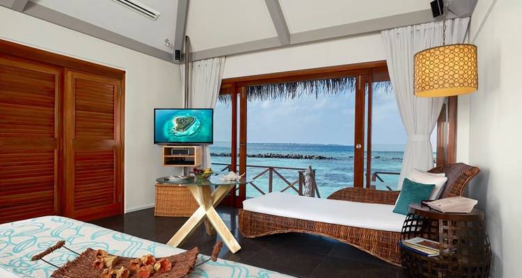 Villa room with ocean view from the balcony.