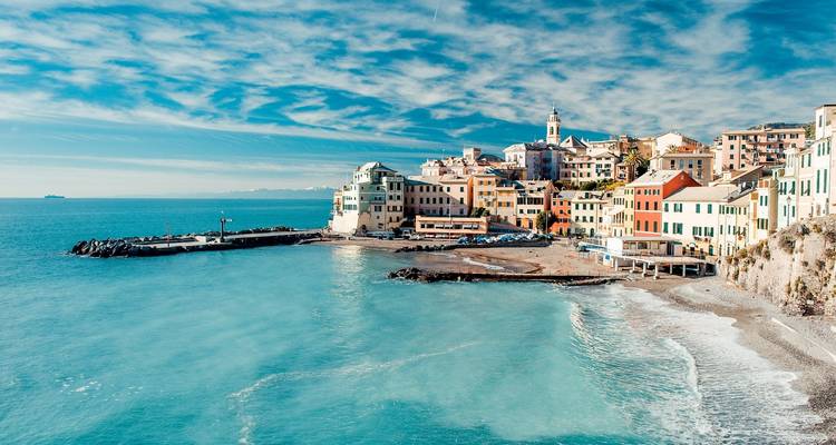 Colorful buildings by the seashore on a clear day.