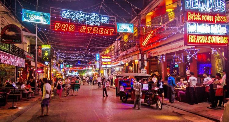 Bustling nightlife scene on a vibrant street.