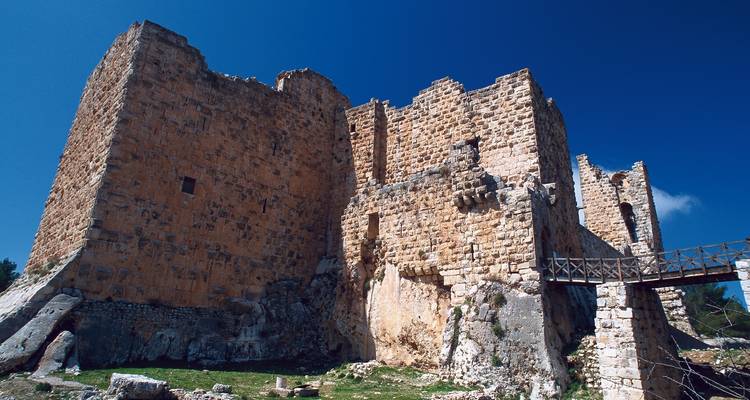 Large stone castle on a sunny day.