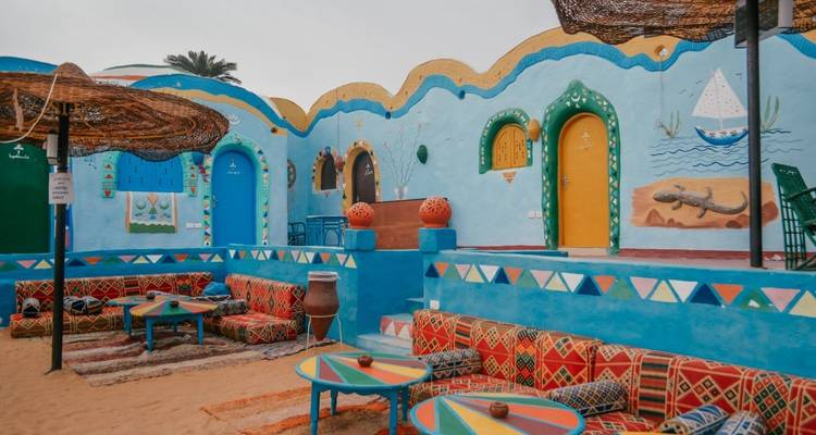 Luxor to Aswan Day Tour: Philae Temple and Nubian Village By Car and Return By Train - Egypt Gift Tours 2