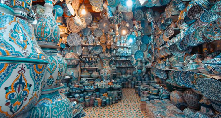 Ceramic shop filled with blue and white pottery.