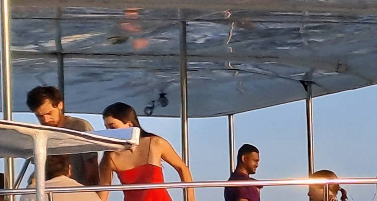 People on a boat cruising.