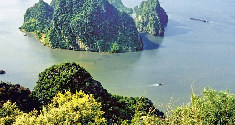 Scenic view of Halong Bay with lush islands and water.