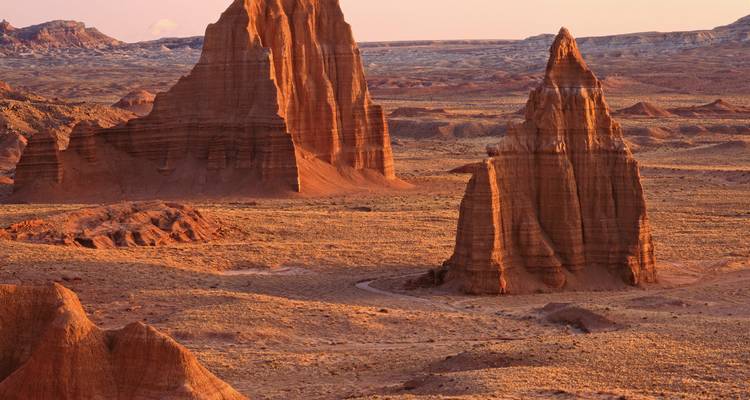Red rock formations in a desert landscape.