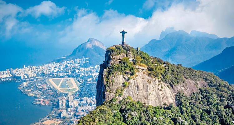 A stunning aerial view of Rio de Janeiro with Christ the Redeemer statue and cityscape.
